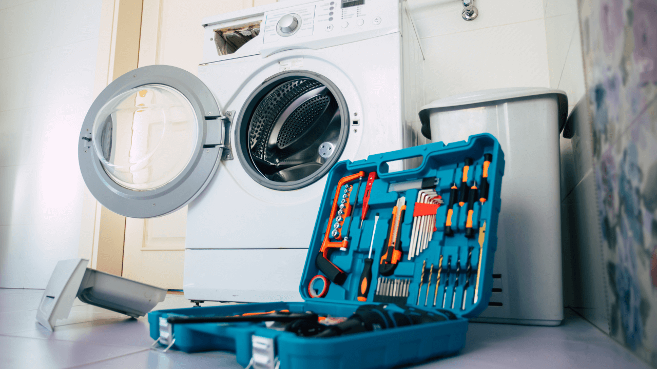 Expert washing machine repair service near me in Bangalore – Skilled technician fixing a washing machine